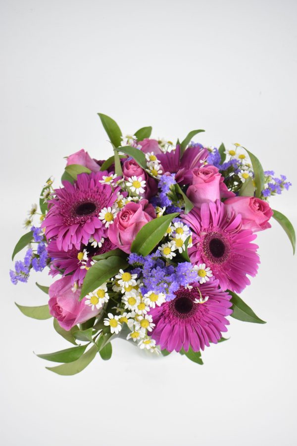 Bouquet of roses, gerbera, sea lavander, and chamomile