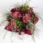 Bouquet of roses, green chrysanthemum, gerbera, alstroemeria and achenes