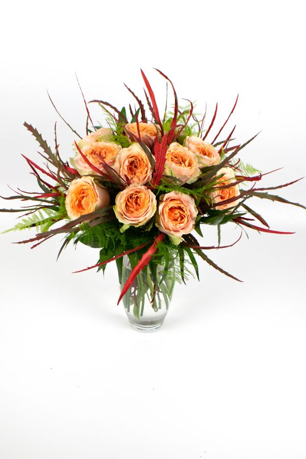 Bouquet of garden kahala roses and red gravilea